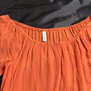 Pheasant top with ruffled bell sleeve